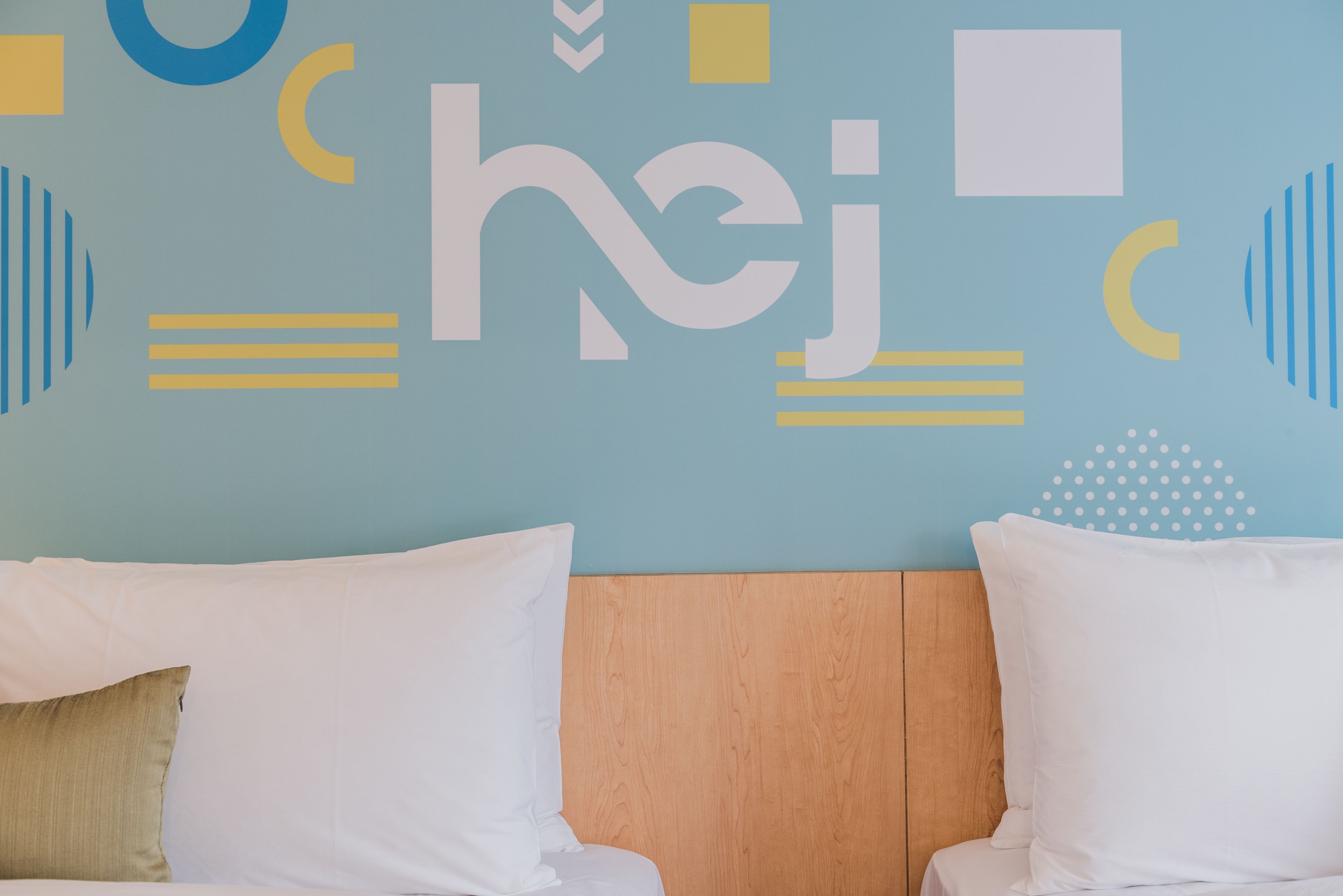 deluxe quadruple room, city view | down duvets, free minibar, in-room safe, desk