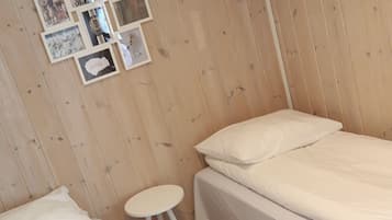 Tabla de planchar con plancha, wifi gratis y ropa de cama