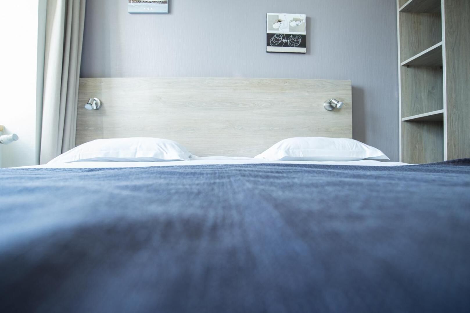 desk, blackout curtains, iron/ironing board, free cots/infant beds