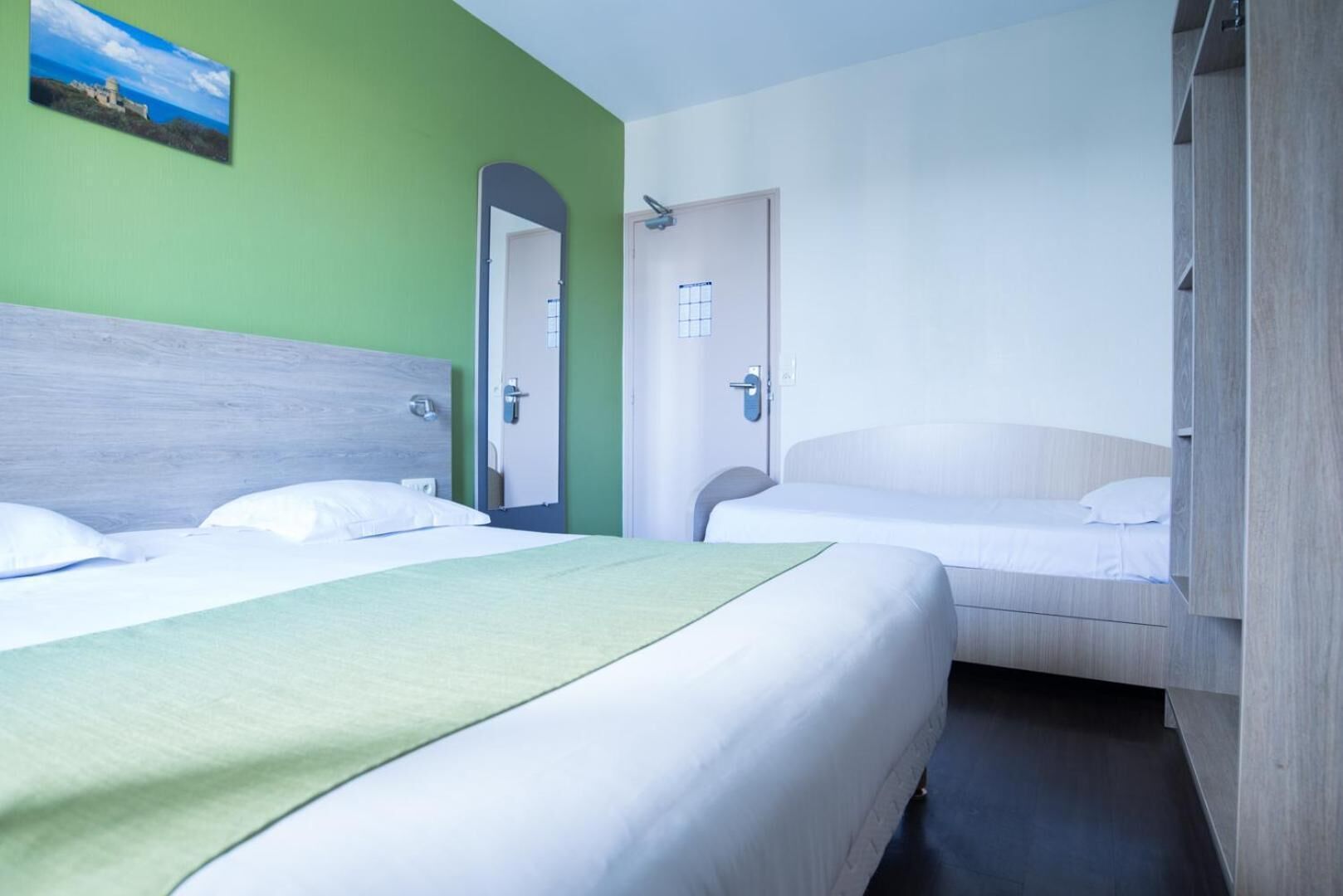 desk, blackout curtains, iron/ironing board, free cots/infant beds