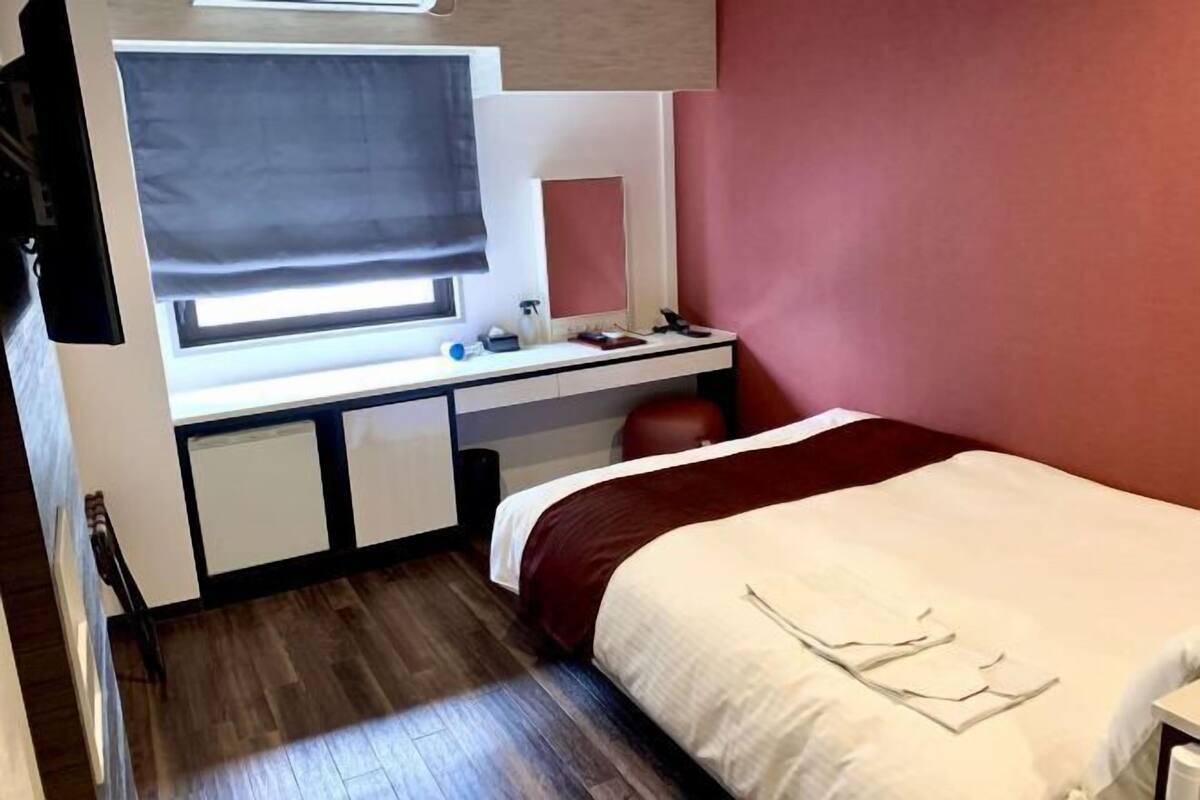 Desk, blackout curtains, iron/ironing board (on request), free WiFi