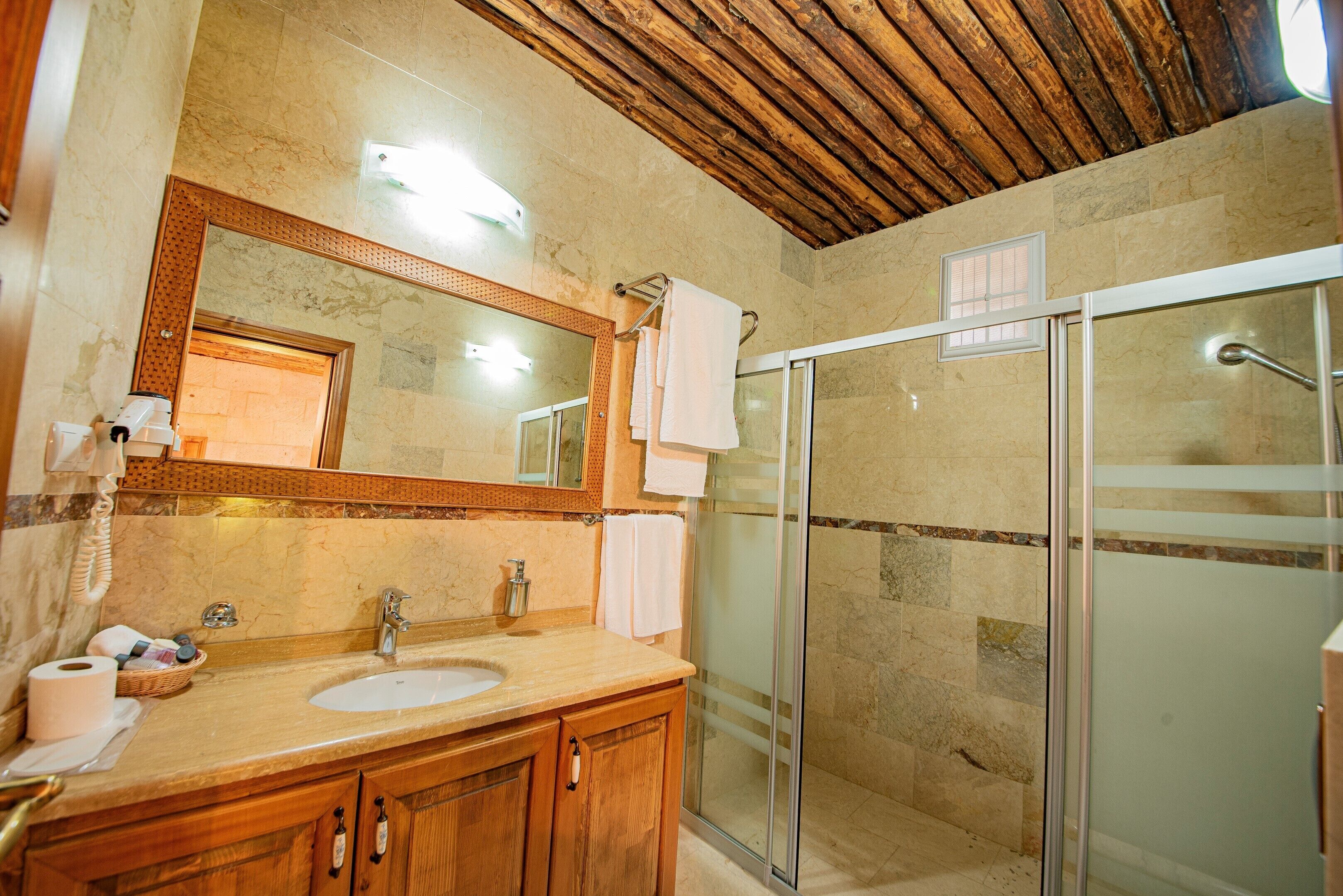superior room | bathroom | shower, hair dryer, slippers, towels