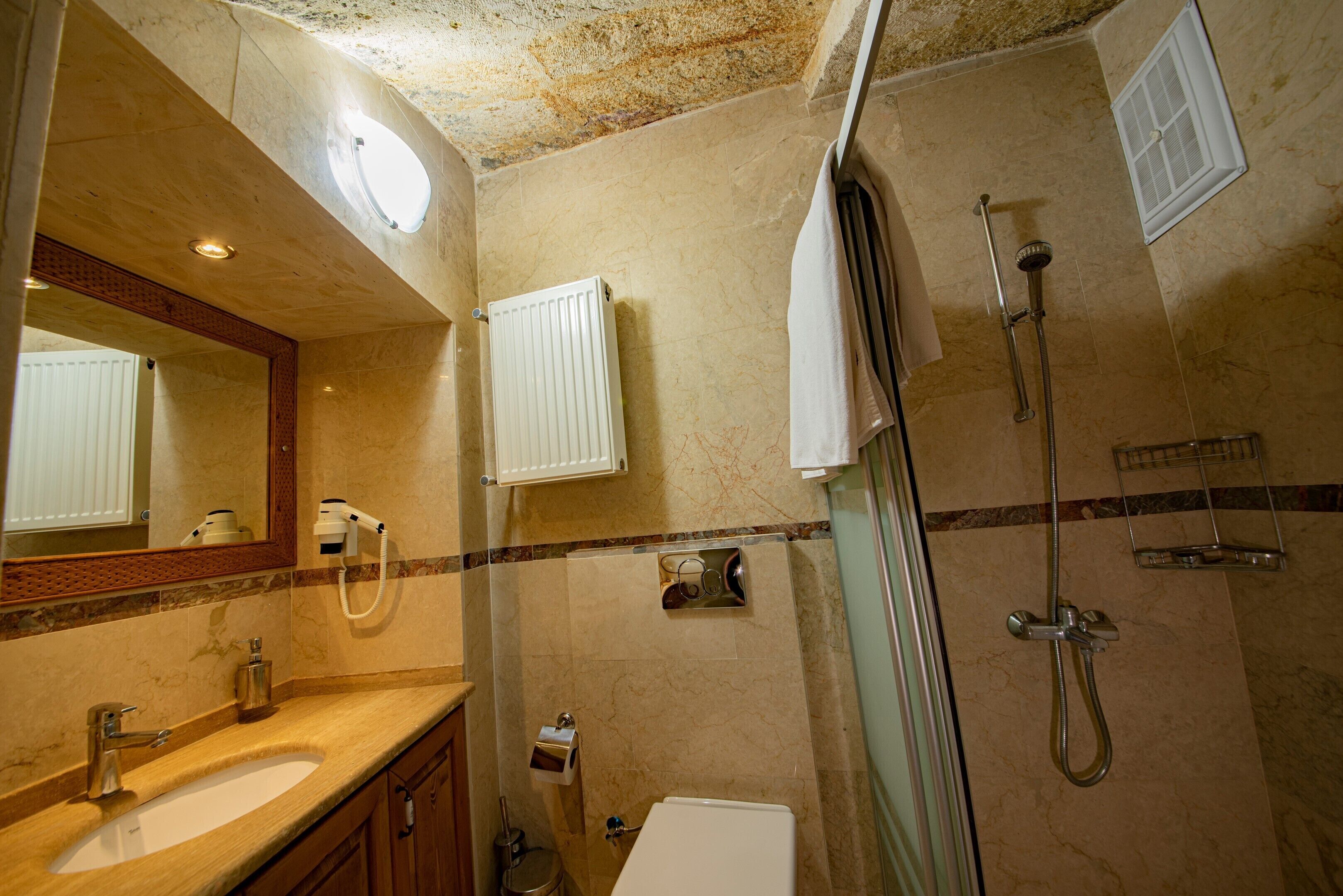 family room | bathroom | shower, hair dryer, slippers, towels