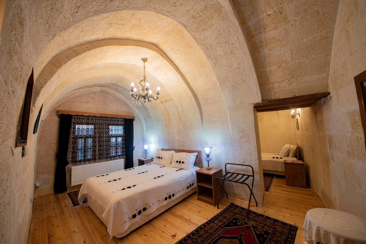 family room | 1 bedroom, in-room safe, desk, iron/ironing board