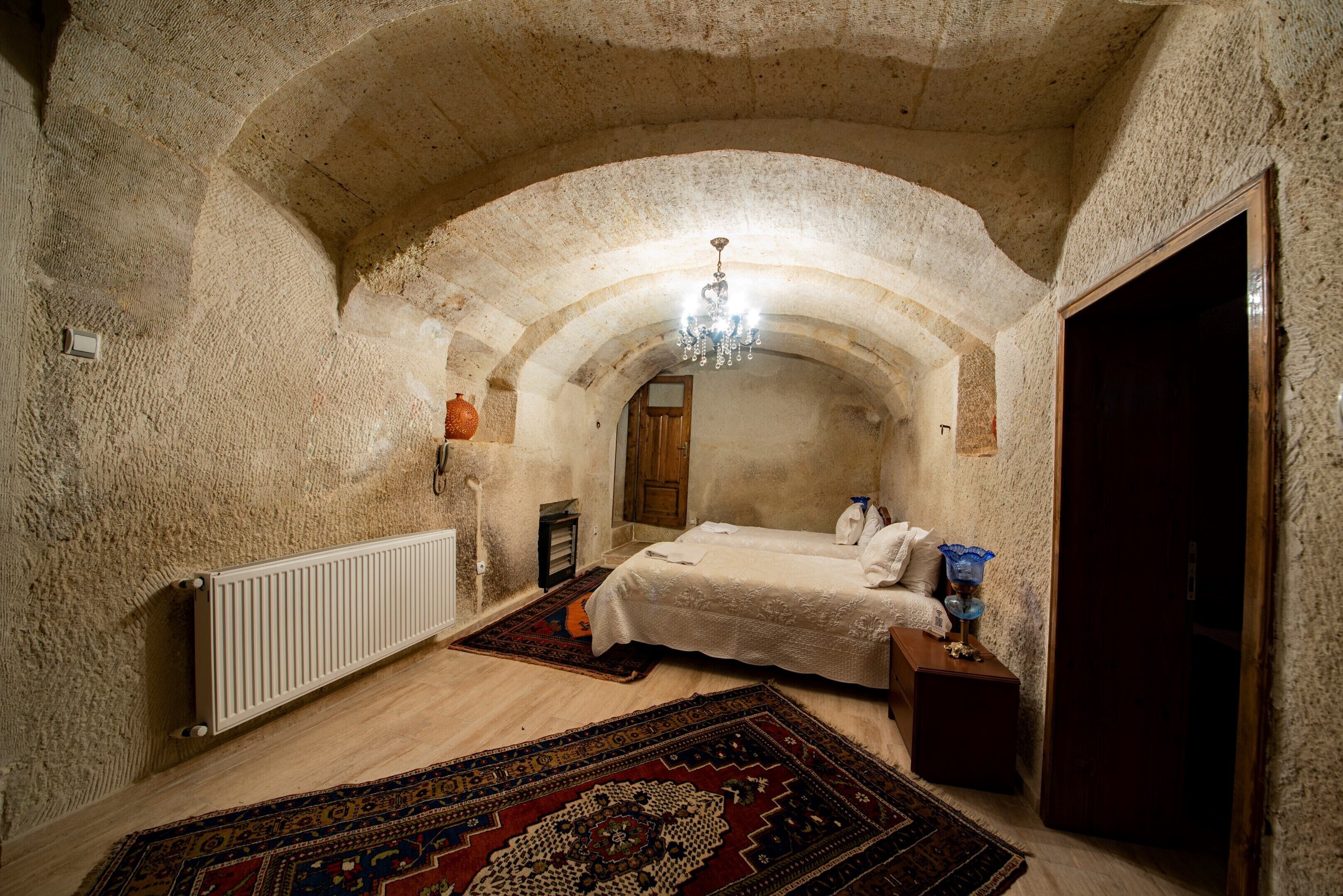 family room | 1 bedroom, in-room safe, desk, iron/ironing board