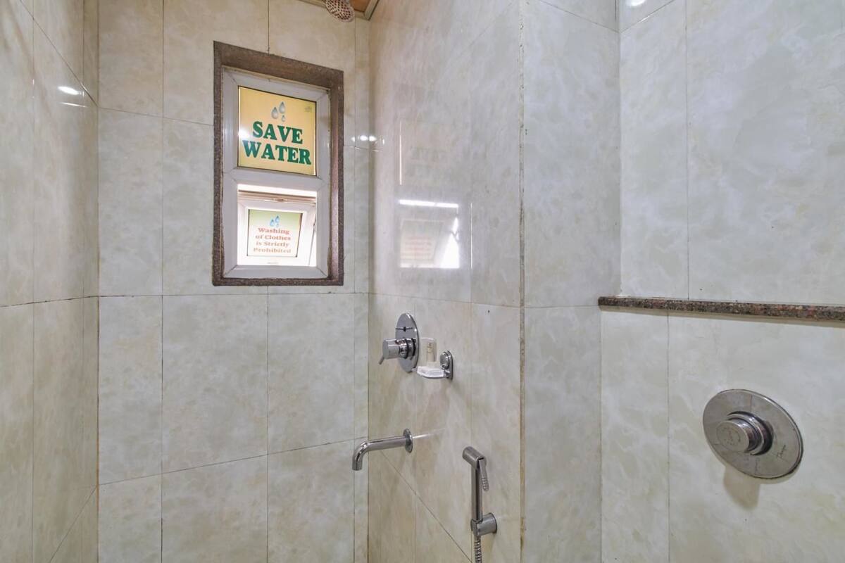 shower, free toiletries, slippers, towels