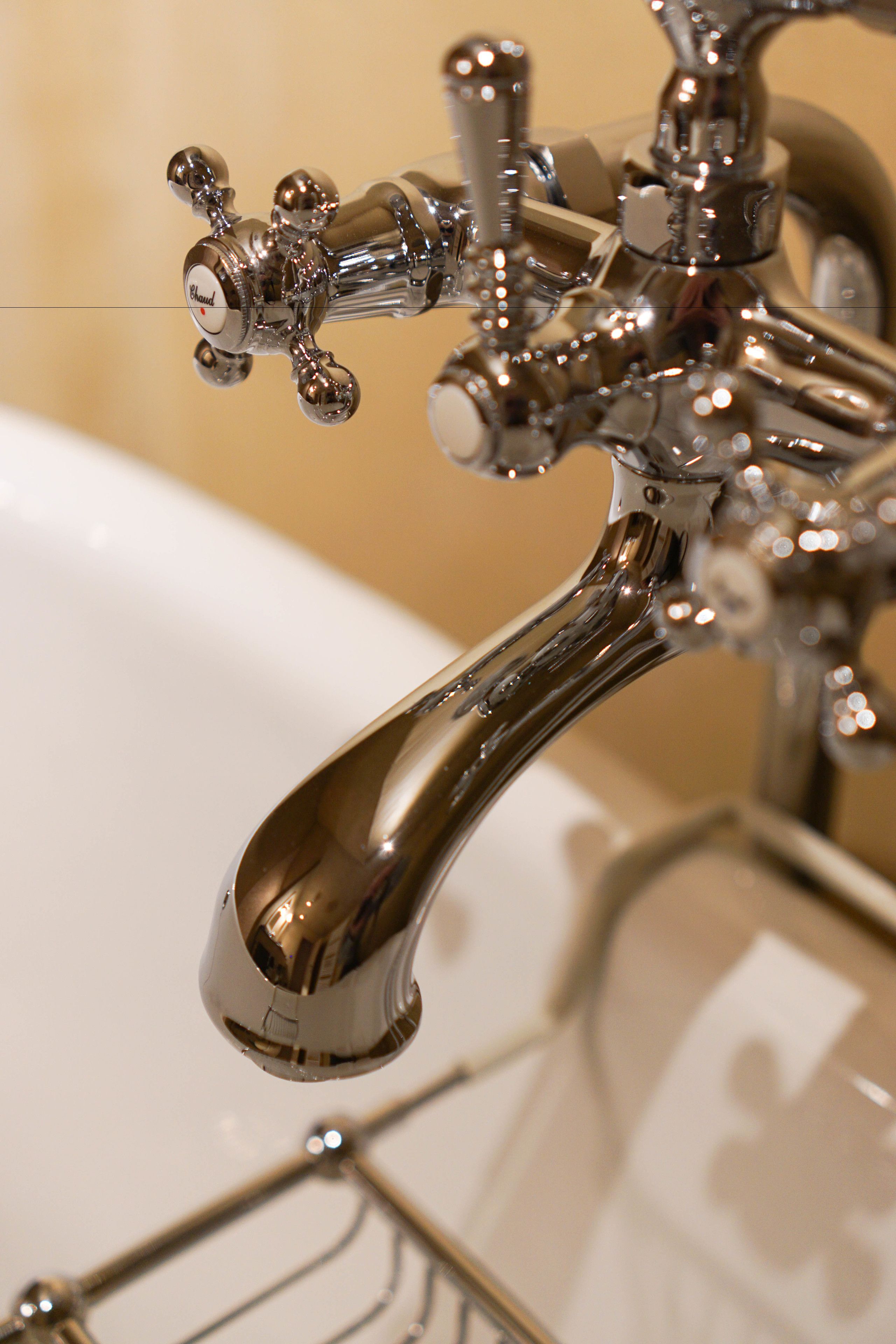 luxury double room | bathroom | separate bathtub and shower, rainfall showerhead, designer toiletries