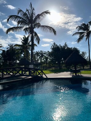 Outdoor pool, free cabanas, pool umbrellas