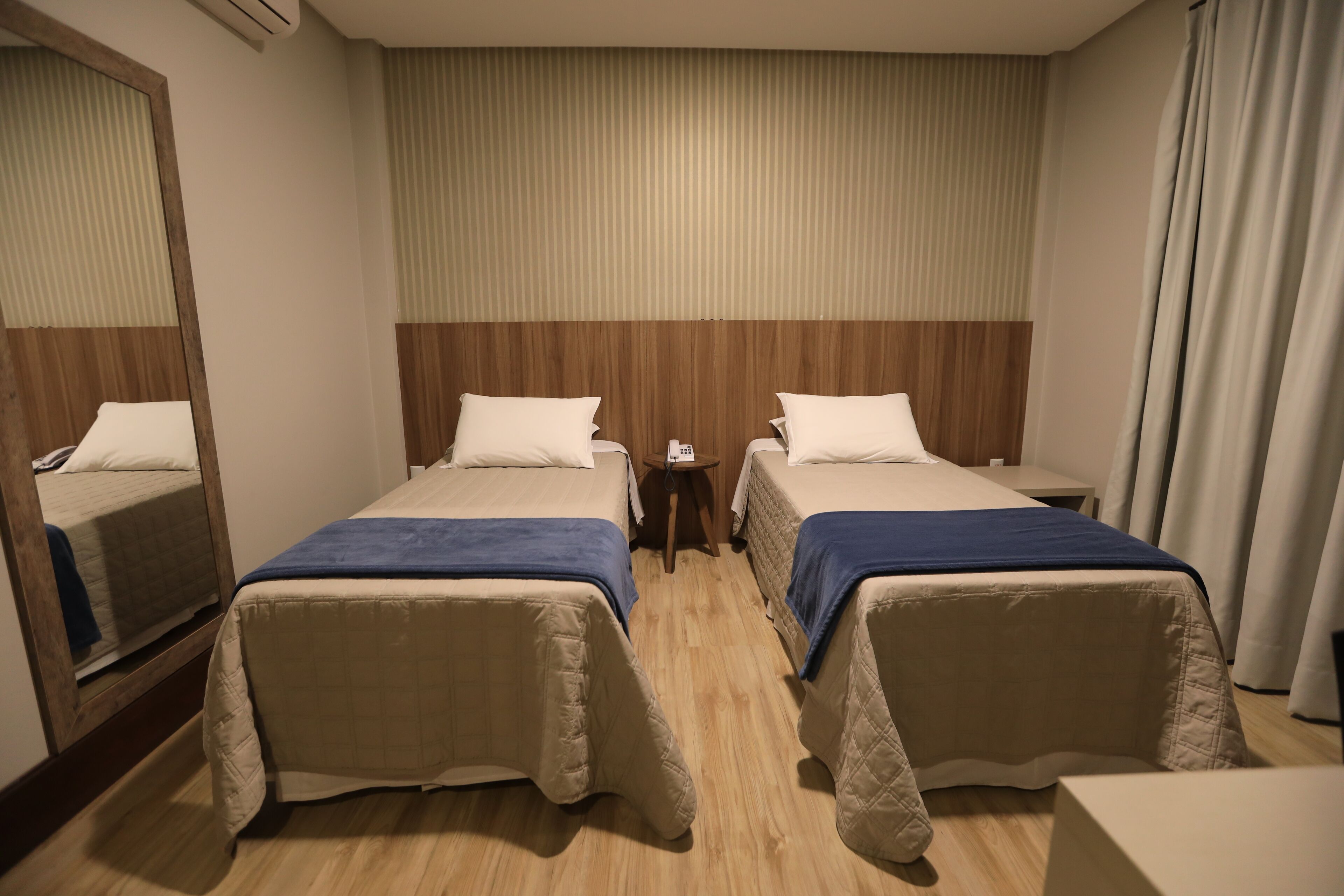 deluxe room | minibar, desk, blackout curtains, soundproofing
