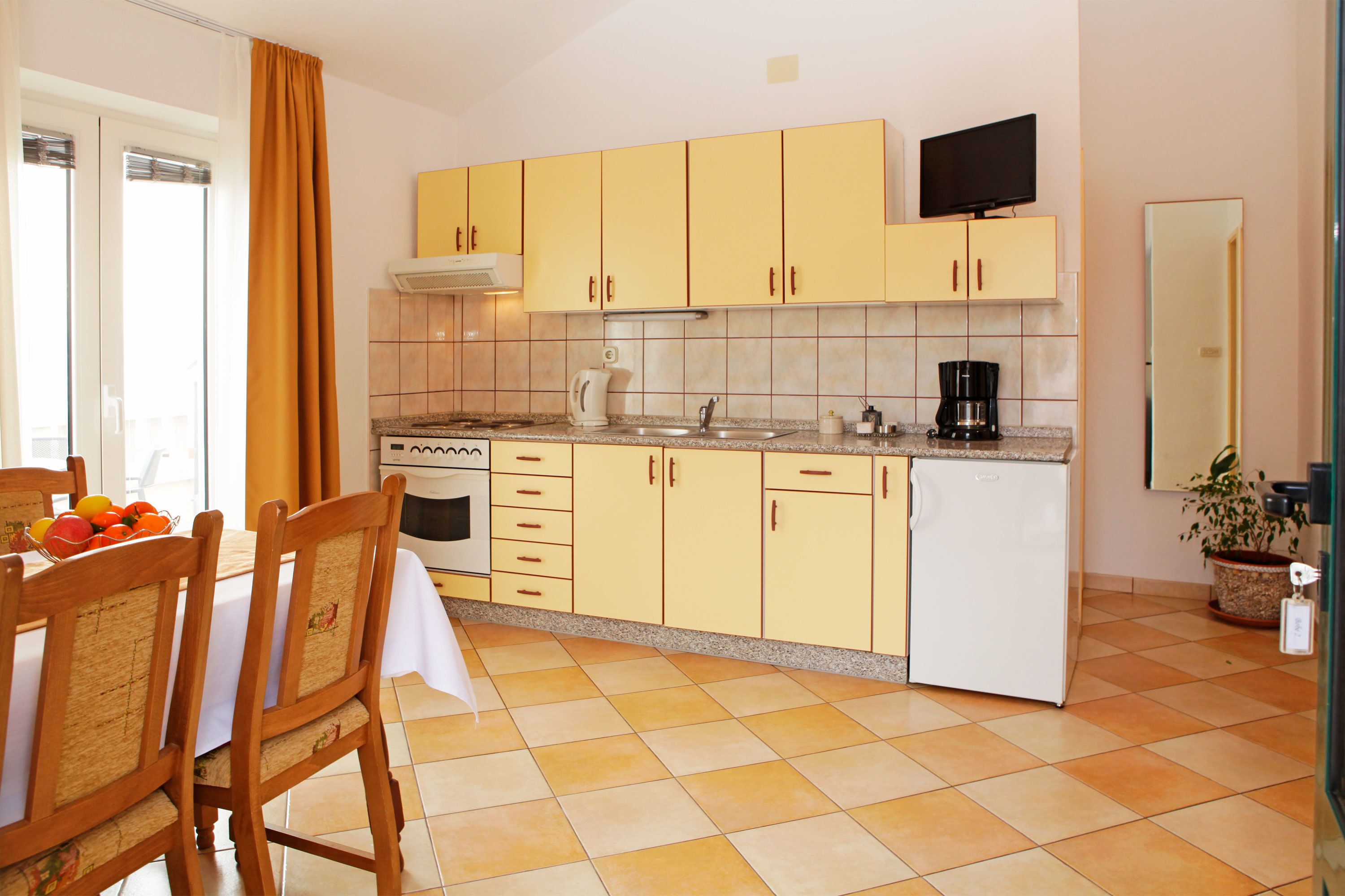 Superior Apartment, 2 Bedrooms | Private kitchenette | Fridge, stovetop, highchair, cookware/dishes/utensils
