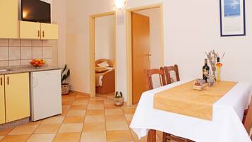 Superior Apartment, 2 Bedrooms | Living area | Flat-screen TV