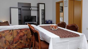 Comfort Apartment, 2 Bedrooms, Garden View, Garden Area | Living area | LCD TV