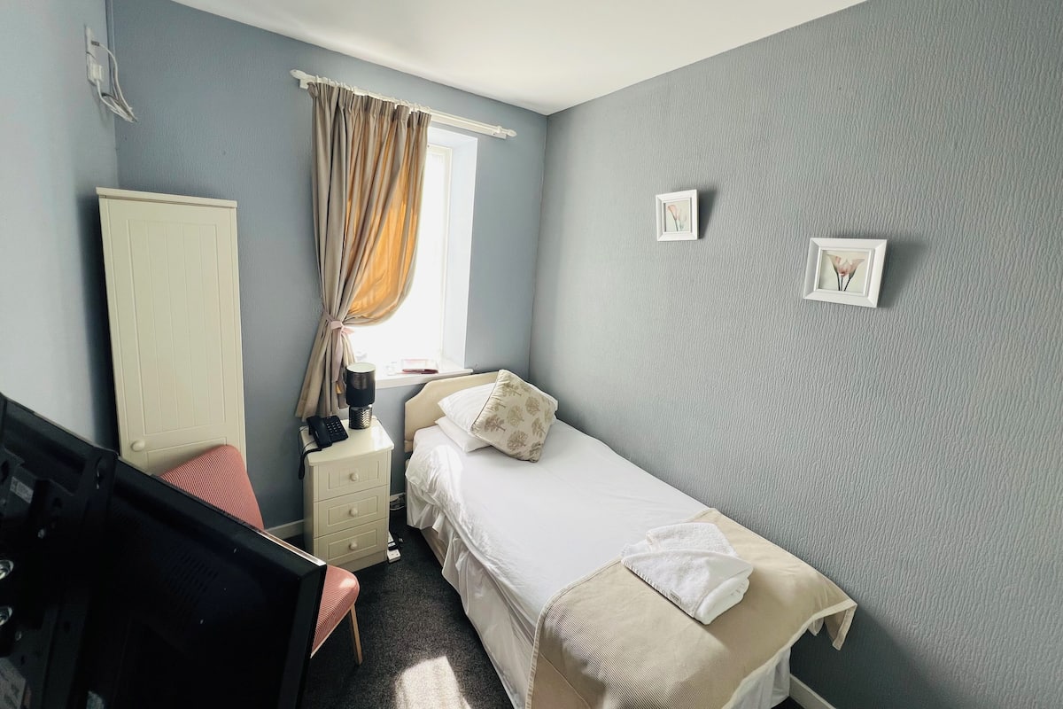 Desk, iron/ironing board, free WiFi, bed sheets