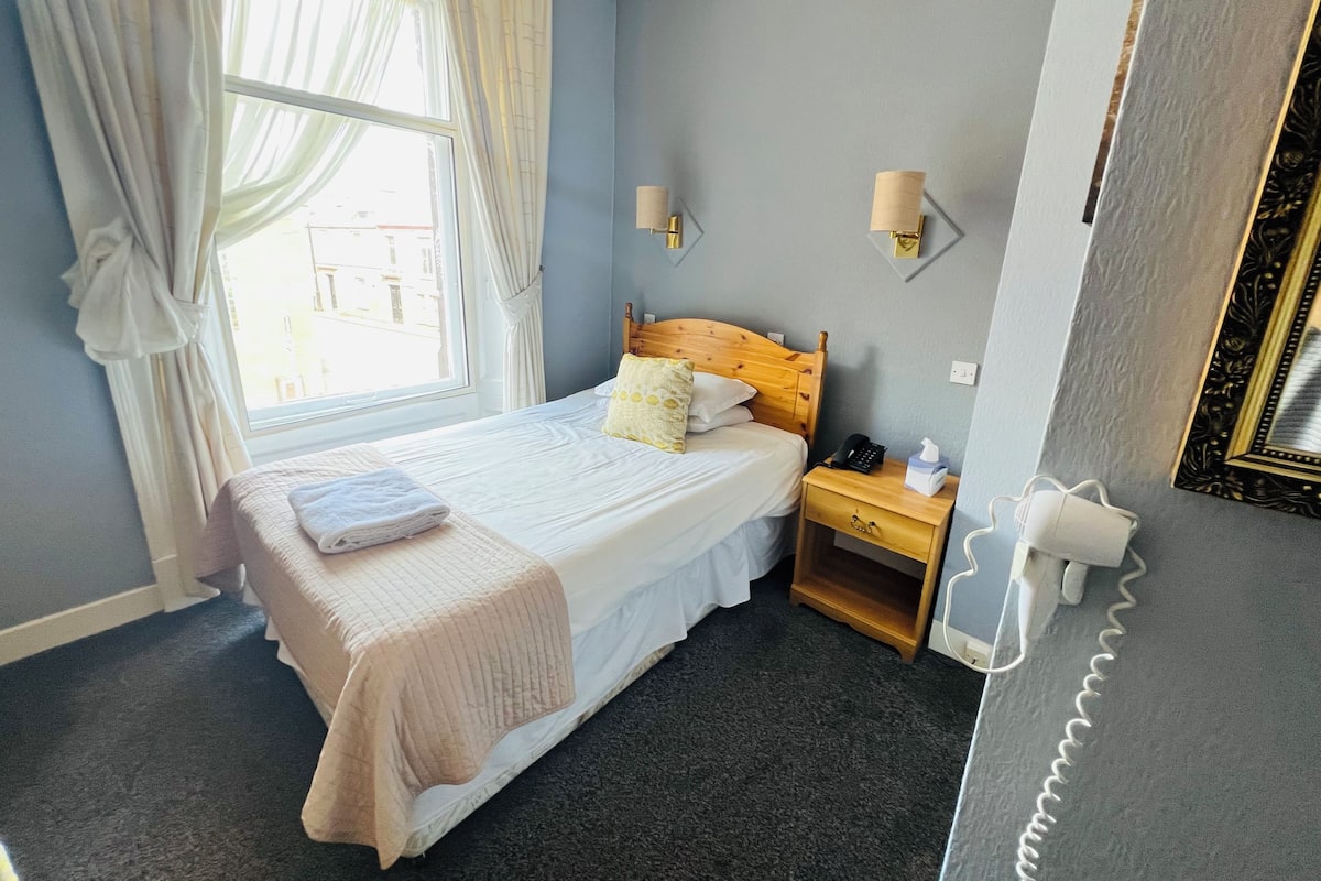 Desk, iron/ironing board, free WiFi, bed sheets