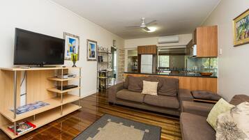 Family Apartment, 2 Bedrooms, Balcony, Ocean View | Living area | TV, DVD player