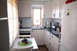 Cabana | Cozinha privada | Geladeira grande, fogão, cooktop, lava-louças