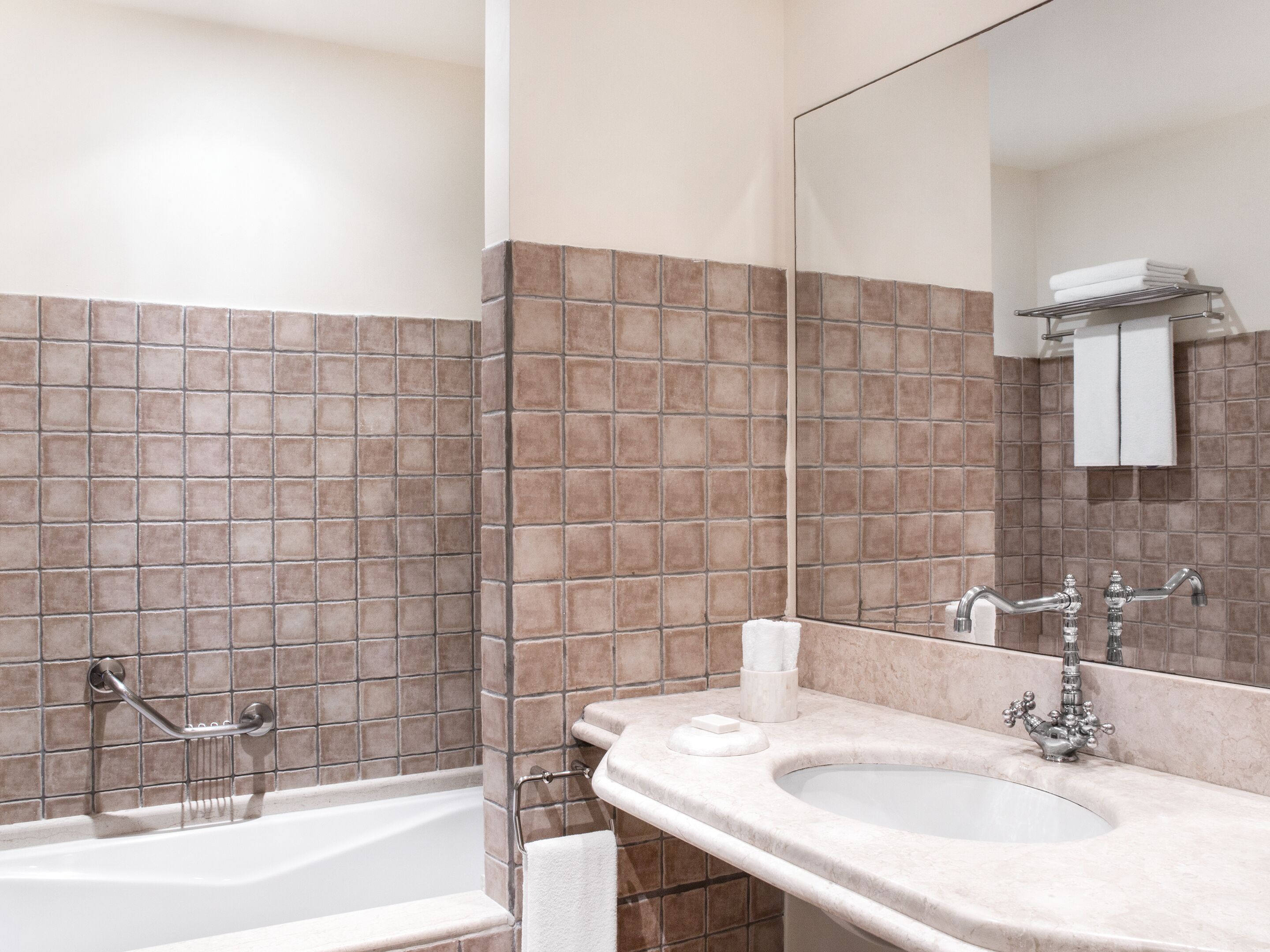 double room side sea view | bathroom | bathtub, hair dryer, towels