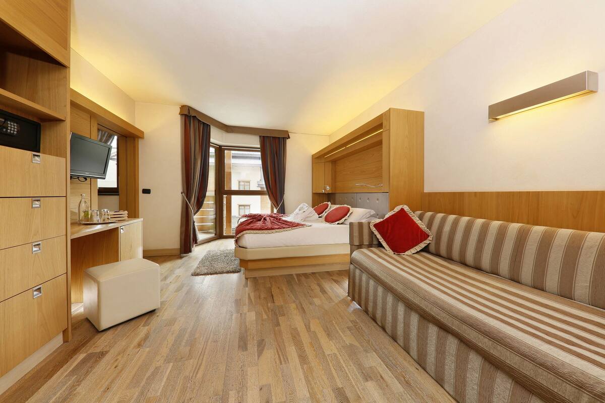 Superior Triple Room, Terrace, Mountainside | Minibar, in-room safe, desk, soundproofing