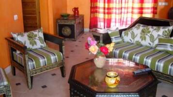 32-inch flat-screen TV with satellite channels, TV