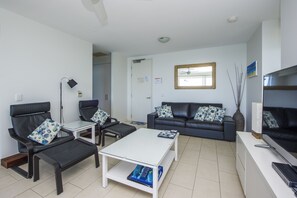 Superior Apartment, 2 Bedrooms, Pool Access, Ocean View | Living room | TV, DVD player