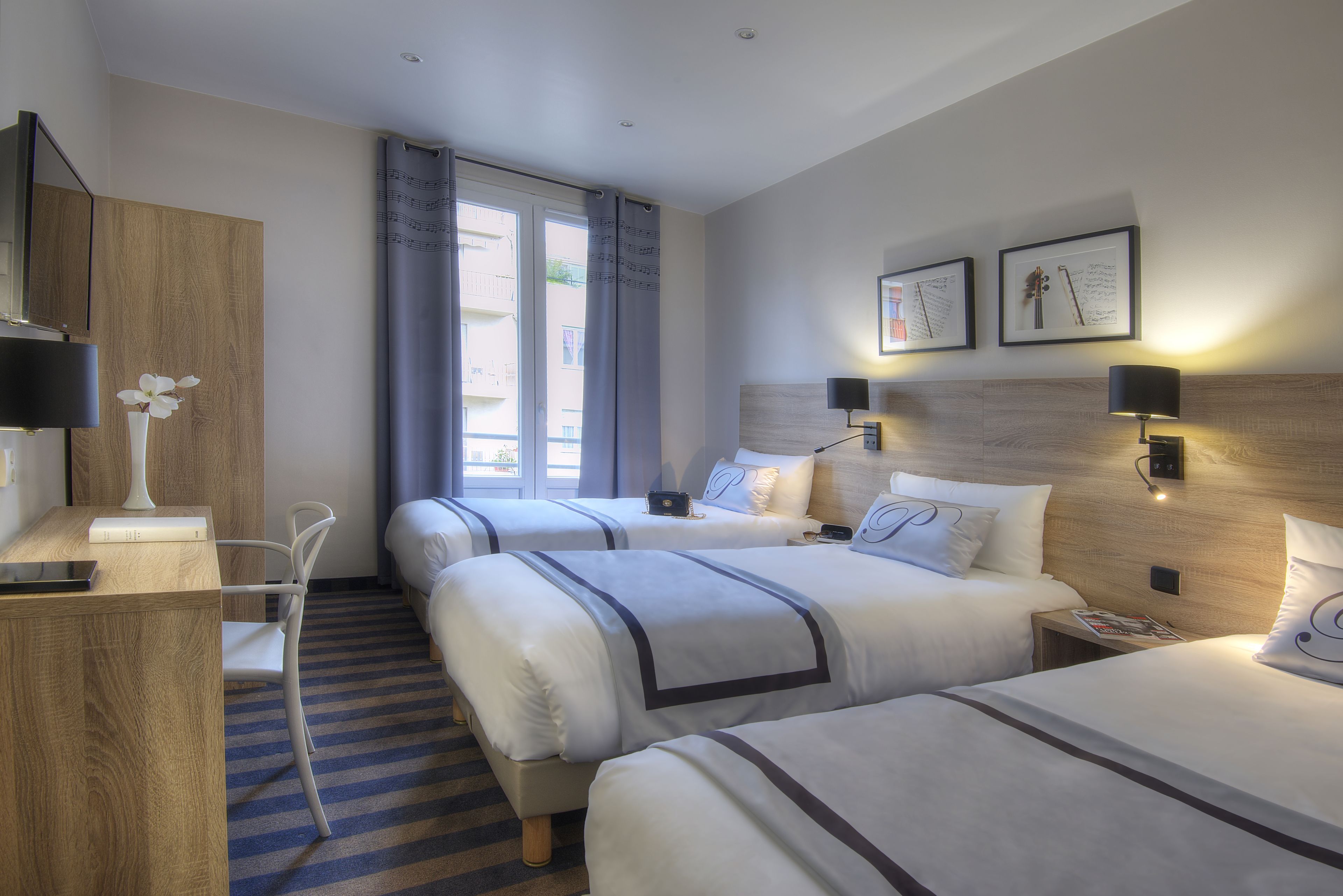 triple room, private bathroom | minibar, in-room safe, desk, soundproofing