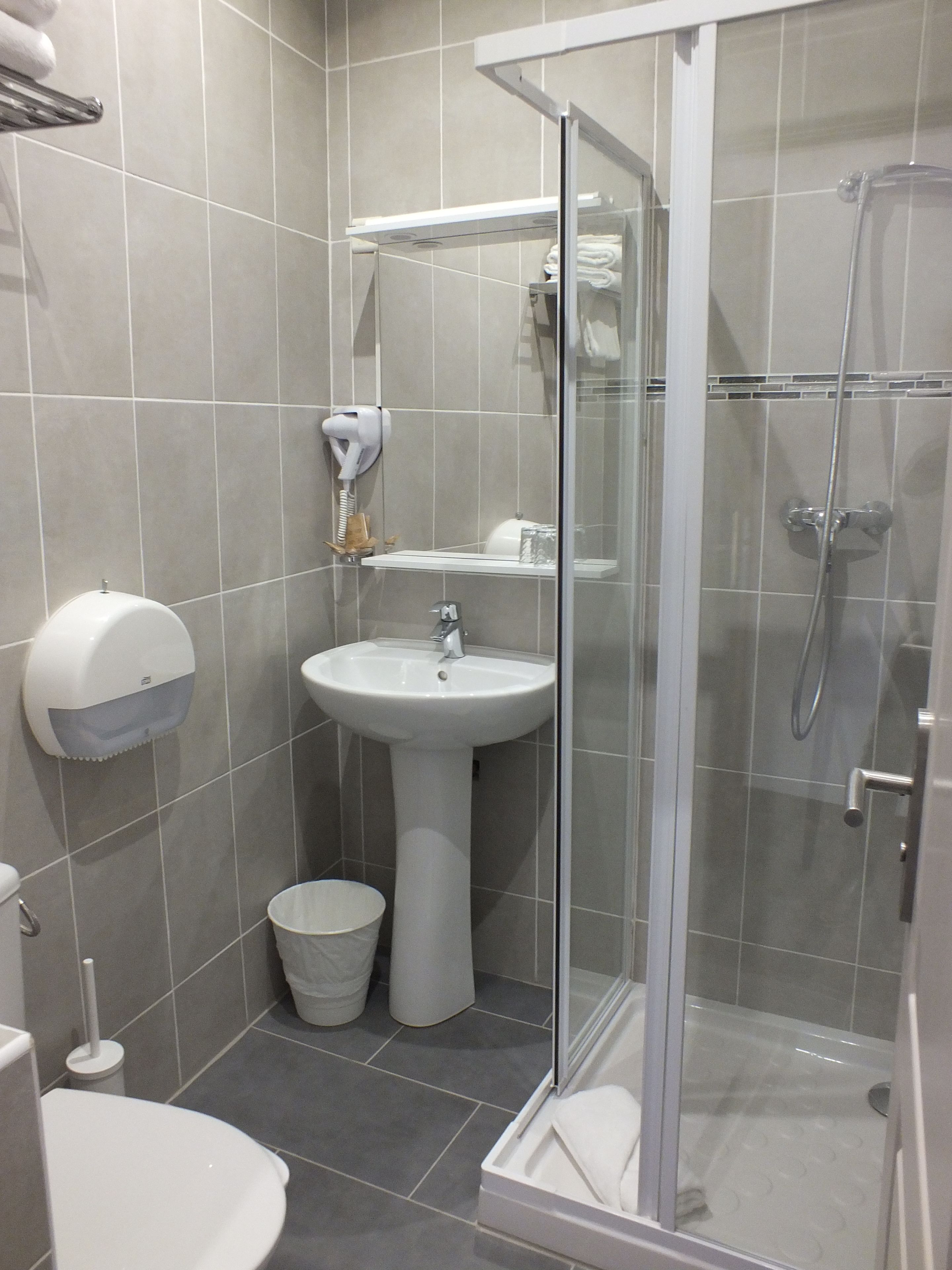 shower, free toiletries, hair dryer, towels