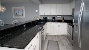 Condo, 3 Bedrooms, Oceanfront | Private kitchen | Coffee/tea maker, full-size fridge, microwave, oven - Beach Club III by Elliott Beach Rentals (North Myrtle Beach)