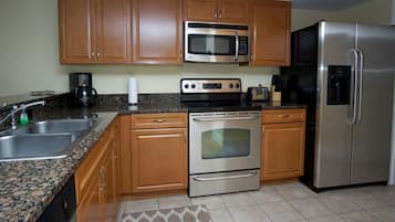Condo, 2 Bedrooms | Private kitchen | Full-size fridge, microwave, oven, stovetop