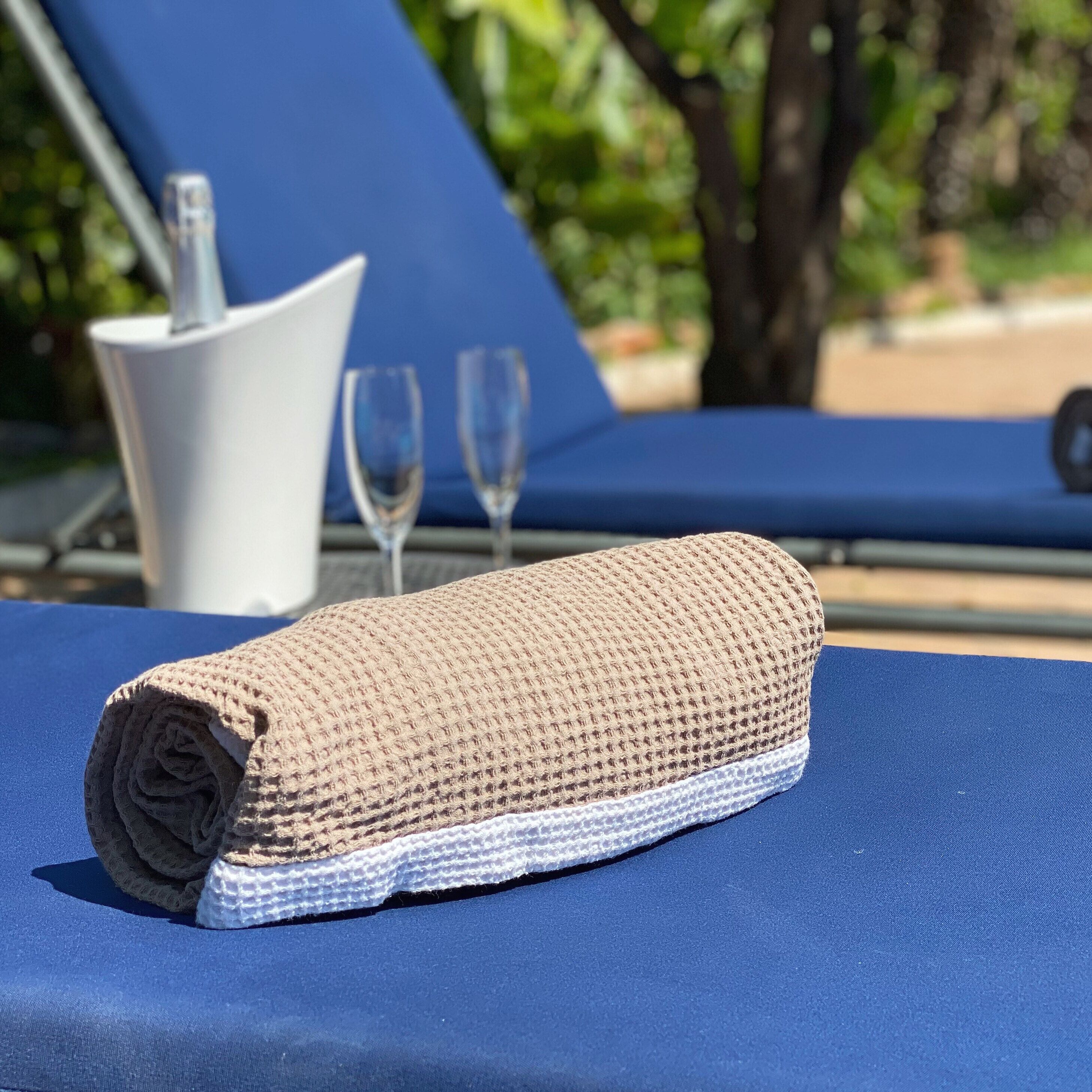 seasonal outdoor pool, open 9:30 am to 7:00 pm, pool umbrellas