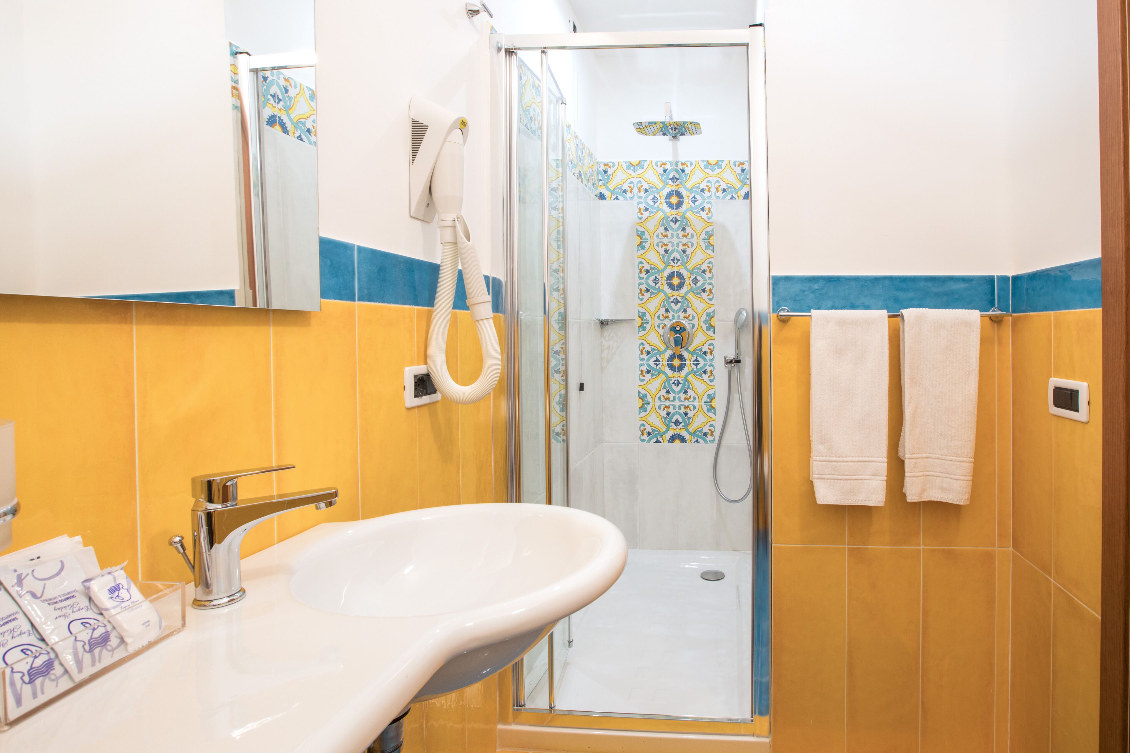 free toiletries, hair dryer, bidet, towels