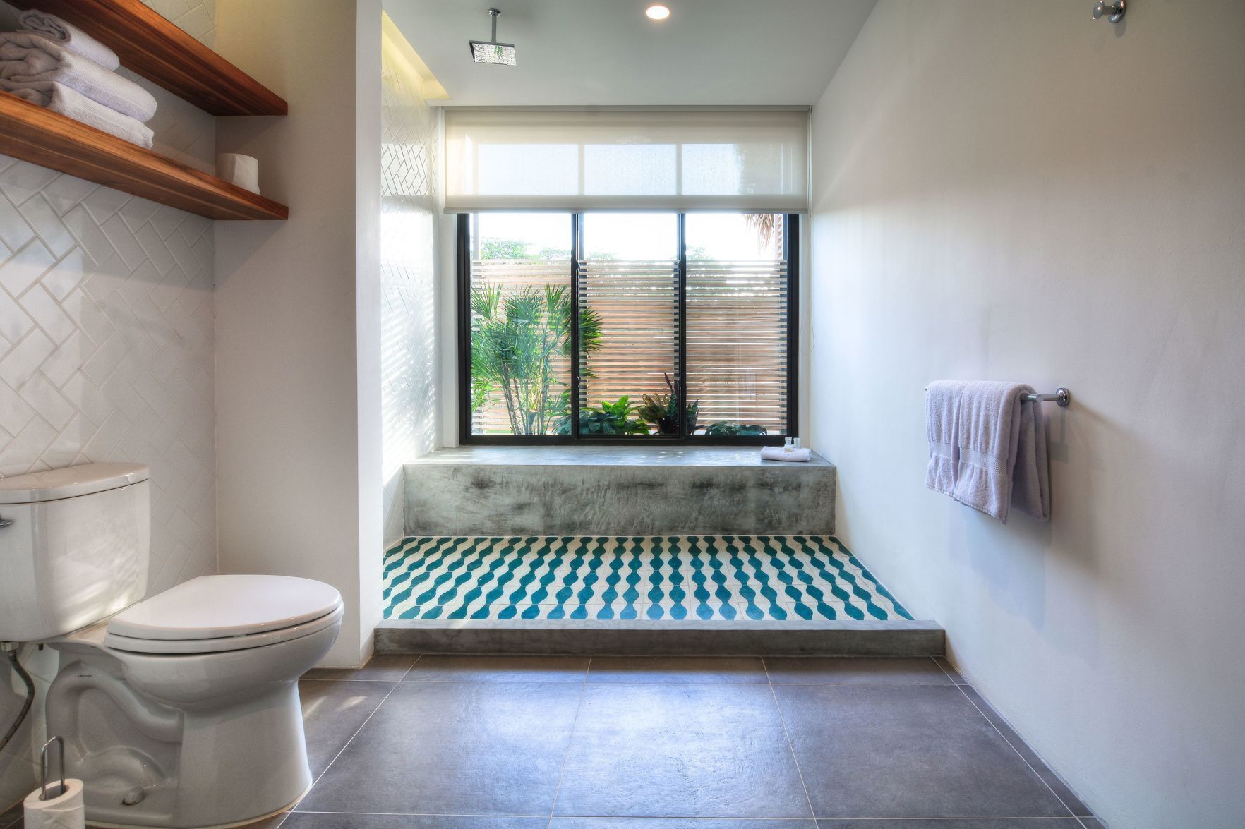 Bathroom | Rainfall showerhead, free toiletries, hair dryer, bathrobes
