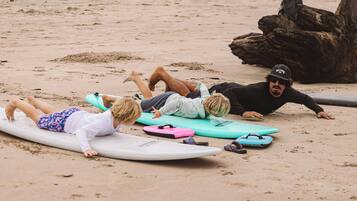 Guests can enjoy surfing and relaxing on the beach.