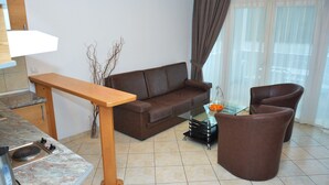 Apartment, 1 Schlafzimmer, Terrasse, Meerblick | Wohnbereich