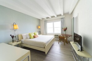 Blackout drapes, iron/ironing board, bed sheets