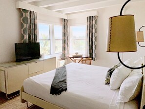 Blackout drapes, iron/ironing board, bed sheets