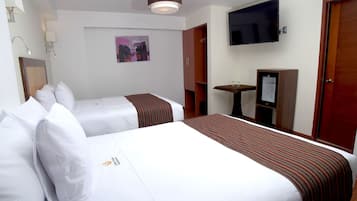 Premium bedding, down comforters, minibar, in-room safe