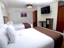 Premium bedding, down comforters, minibar, in-room safe