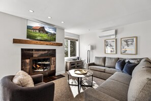 TV, fireplace - Bear Claw 207 Premium On Mountain Condo With Ski-In/Ski-Out Access! (Steamboat Springs)