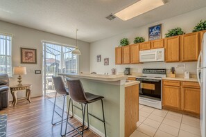 Fridge, microwave, oven, stovetop - Spacious Pool Home w/ 2 Masters, Games Room & Conservation View. Near Disney (Davenport)
