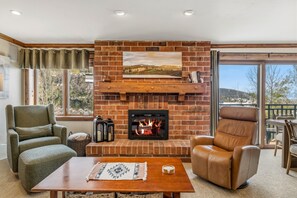 TV, fireplace - Bear Claw 413 Premium On Mountain Condo With Ski-In/Ski-Out Access! (Steamboat Springs)
