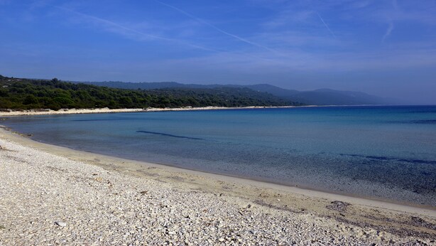 A pebble beach with clear water and distant hills. - Aunt Regina House, authentic house from 1882. with magnificent see view (Božava)