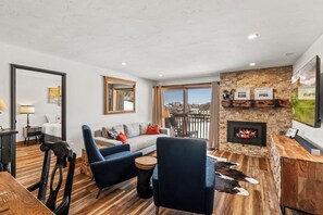 TV, fireplace - Bear Claw 310 Premium On Mountain Condo With Ski-In/Ski-Out Access! (Steamboat Springs)