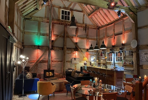 Two properties next door to each other with a games room, hot tub and bicycles