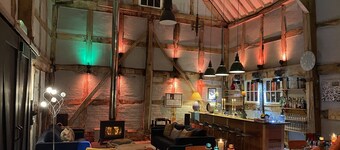 Two properties next door to each other with a games room, hot tub and bicycles