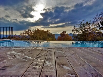 Cute vacation house surrounded by green area