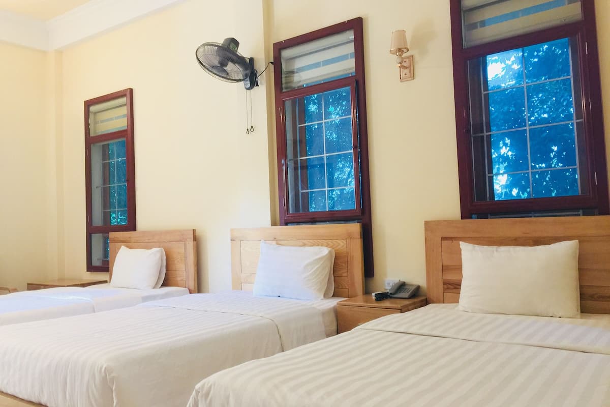 panoramic triple room, 1 bedroom, courtyard view, courtyard area | 1 bedroom, minibar, desk, laptop workspace