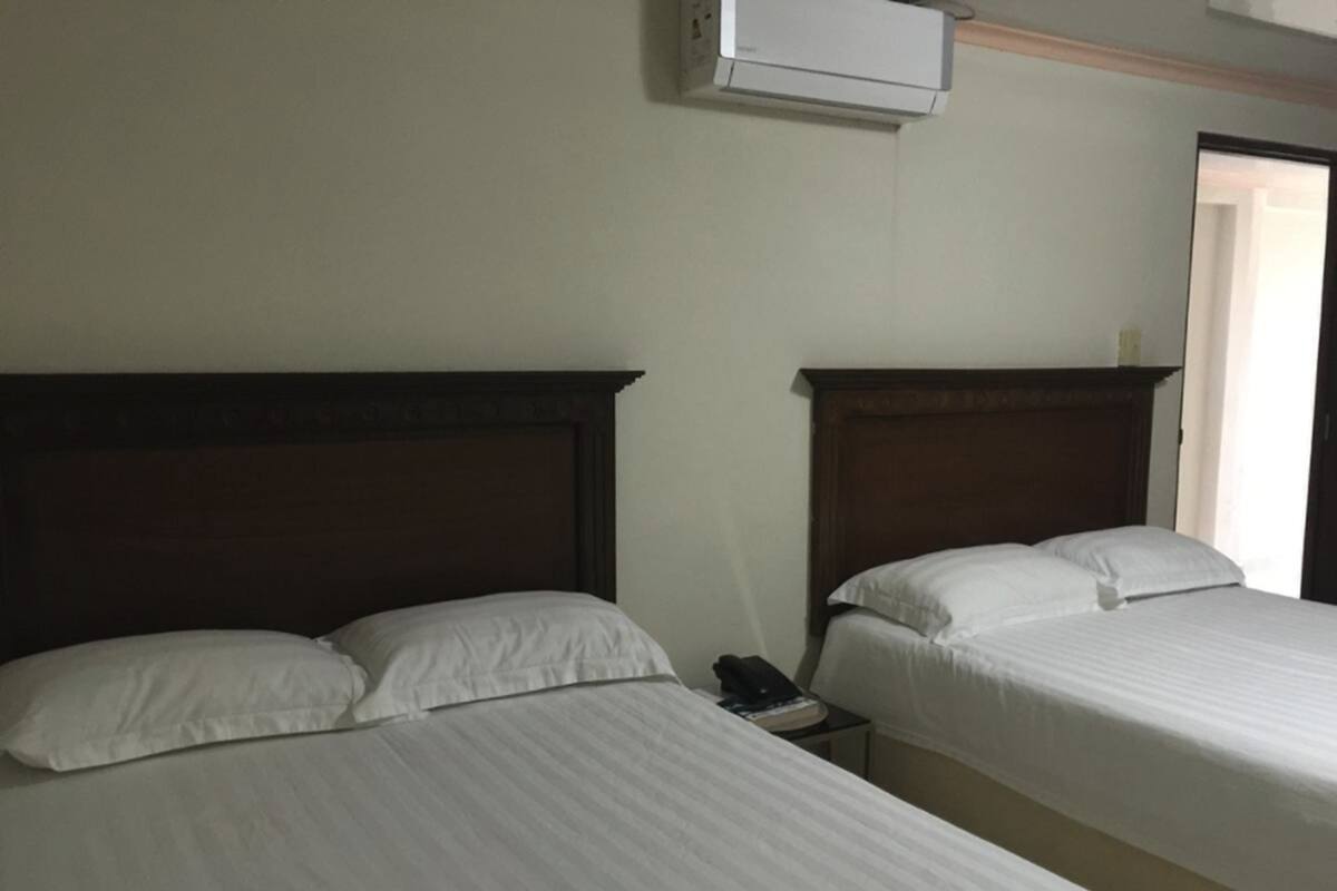 Double Room, 2 Double Beds | WiFi (free), bed sheets