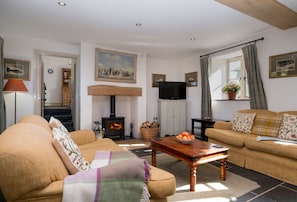 Ground floor:  Sitting room with wood burning stove