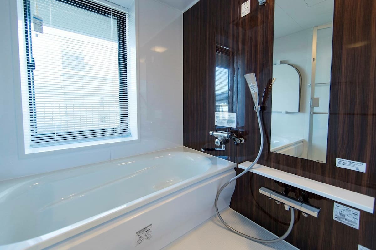 suite mountain view twin room | bathroom | separate bathtub and shower, deep-soaking bathtub, free toiletries