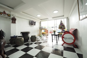 Coin salon dans le hall